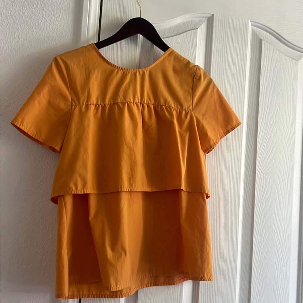 Bought in India. Medium. Turmeric yellow-orange. Size medium.
